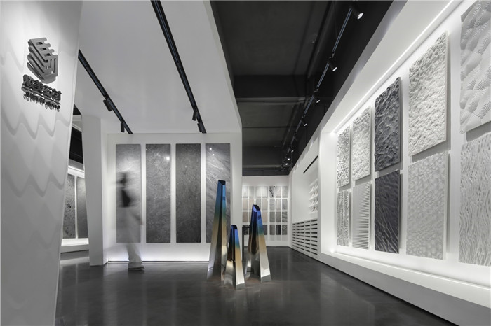 黑白灰構造極簡藝術風駿美石材展廳展示區(qū)裝修設計方案